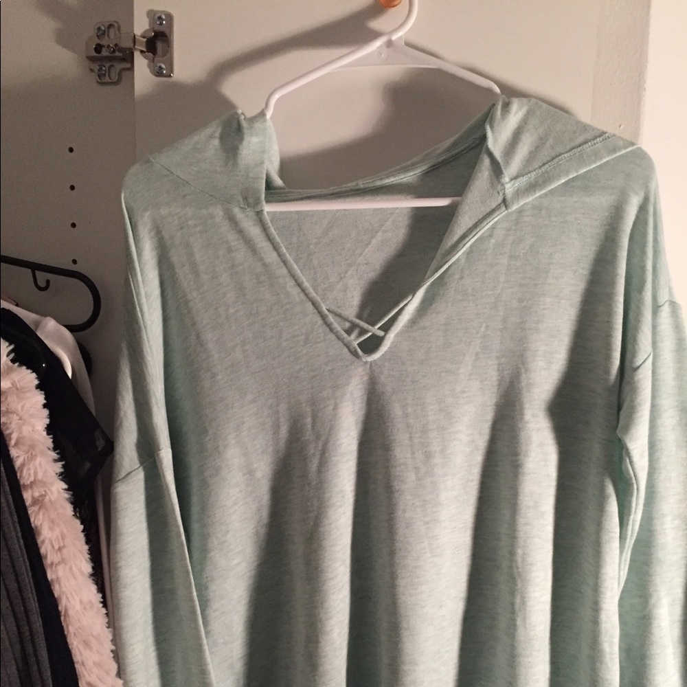 Long sleeve light blue/green shirt with hood